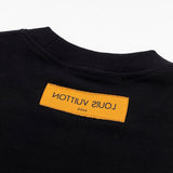 Side profile of Louis Vuitton luxury clothing with runway-inspired design
