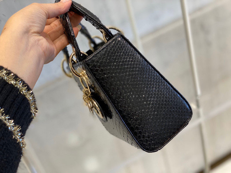 Styled lifestyle shot of polished sleek women's handbag – women's premium purse