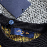 Back view of Louis Vuitton luxury clothing with label-forward styling