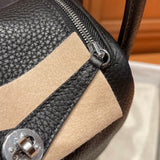 Close-up detail of poised bag design