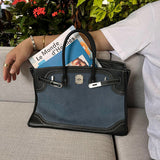 Side view of versatile structured handbag
