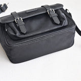 Side profile of polished statement women's handbag – women's luxury handbag