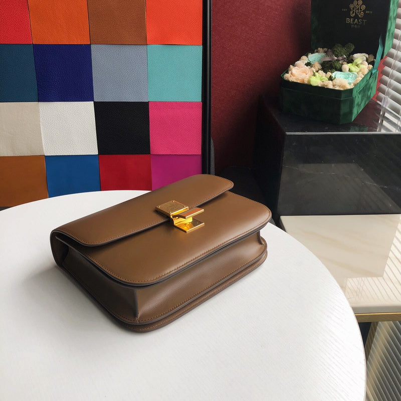 Styled lifestyle shot of statement modern women's handbag – women's luxury handbag