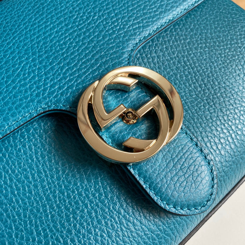 Back view of signature polished women's handbag – women's everyday handbag