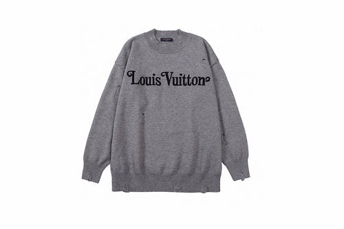 Full styled look of Louis Vuitton luxury clothing with label-forward styling