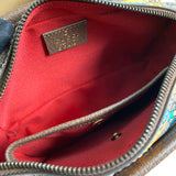 Side profile of structured premium women's handbag – women's luxury accessory
