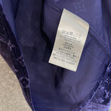 Close-up detail shot of Louis Vuitton luxury clothing with everyday silhouette
