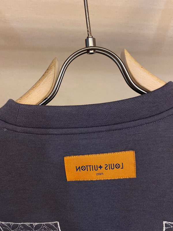Side profile of Louis Vuitton luxury clothing with runway-inspired design