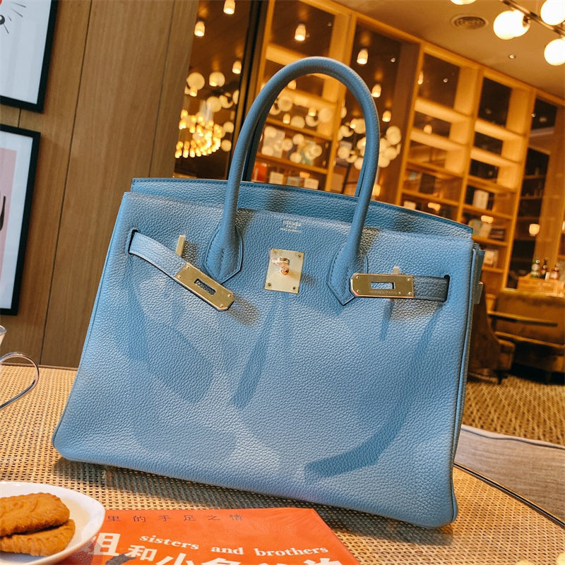 Side view of versatile structured handbag