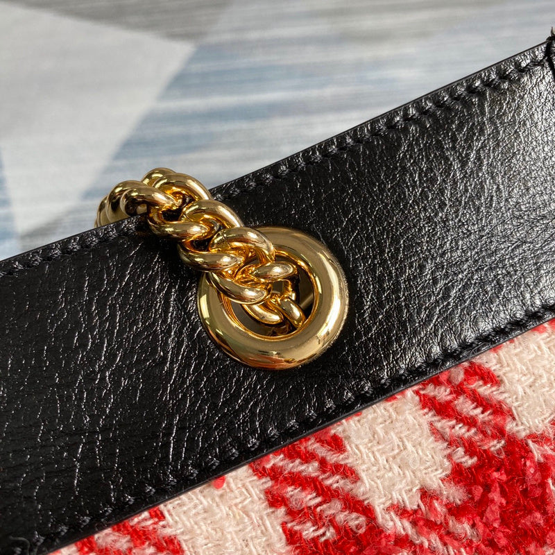 Close-up detail of elevated polished women's handbag – women's designer-style accessory