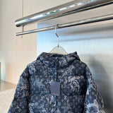 Close-up detail shot of Louis Vuitton luxury clothing with signature branding