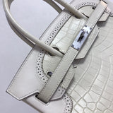 Side view of everyday-ready structured handbag