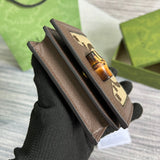 Handle and strap detail of sleek signature women's handbag – women's designer-style accessory