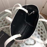 Interior view of statement everyday-luxe women's handbag – women's luxury accessory