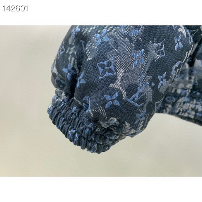 Flat lay presentation of Louis Vuitton luxury clothing with streetwear-inspired cut