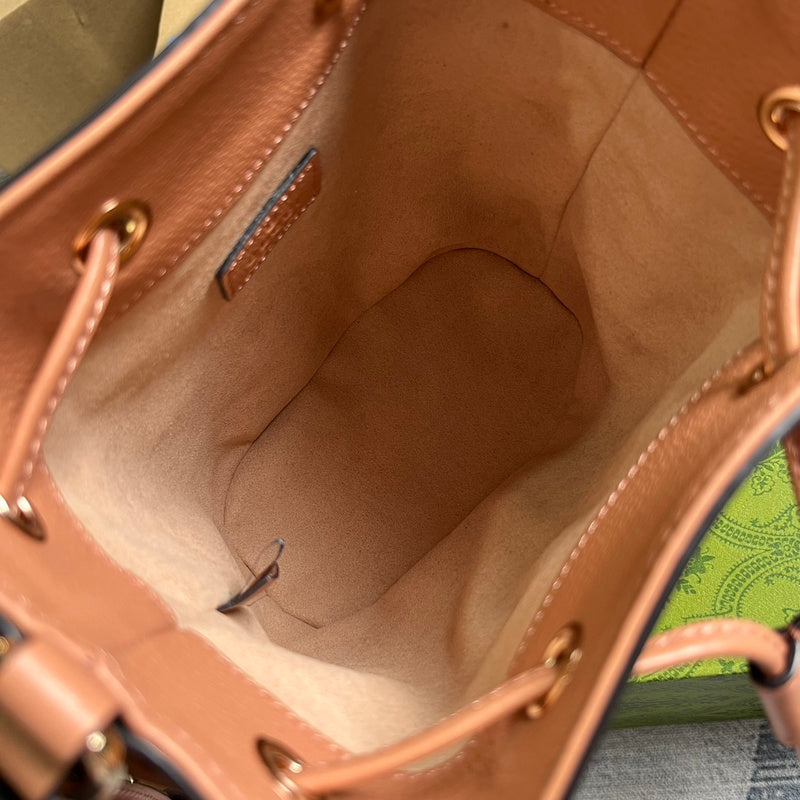 Side profile of refined signature women's handbag – women's statement bag