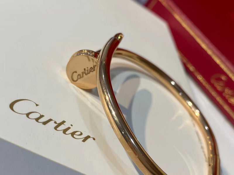Angled view of Cartier unisex jewelry piece