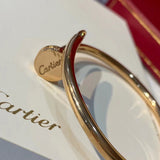 Angled view of Cartier unisex jewelry piece