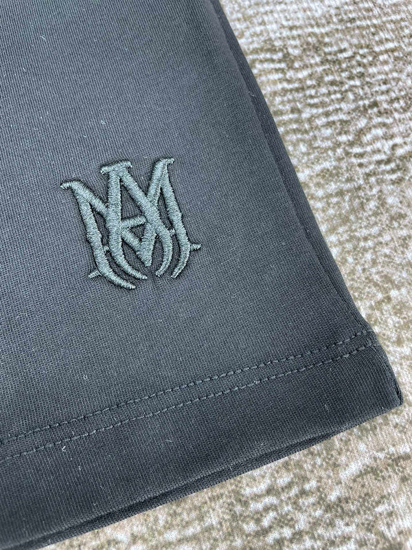 Three-quarter angle view of Amiri luxury piece style No.050