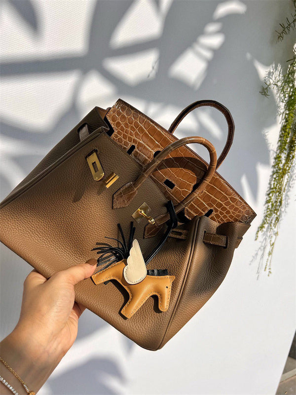  Essential satchel carried on shoulder 10