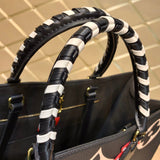 Front view of refined modern women's handbag – women's premium purse