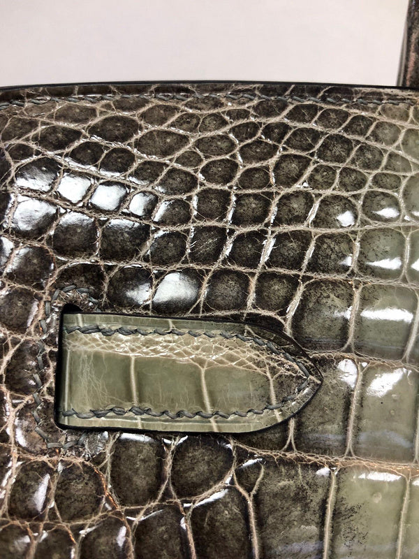 Side view of classic structured handbag