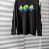 Back view of Louis Vuitton luxury clothing with label-forward styling