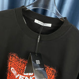Close-up detail shot of Givenchy luxury clothing with monogram-inspired silhouette