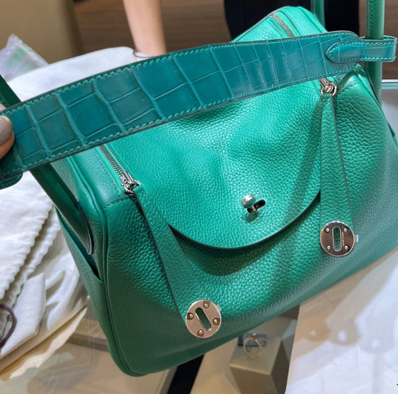 Side view of effortless structured handbag