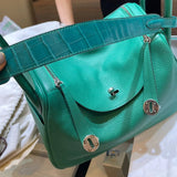 Side view of effortless structured handbag