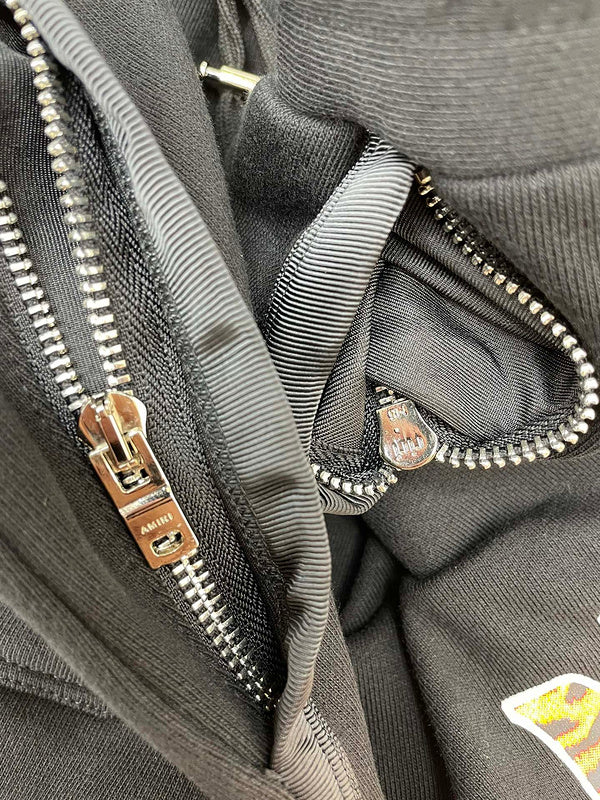 Texture and finish detail of Amiri luxury piece style No.058