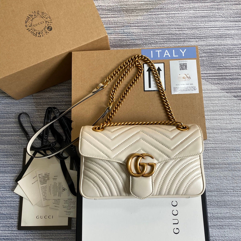 Side profile of signature polished women's handbag – women's designer-style accessory