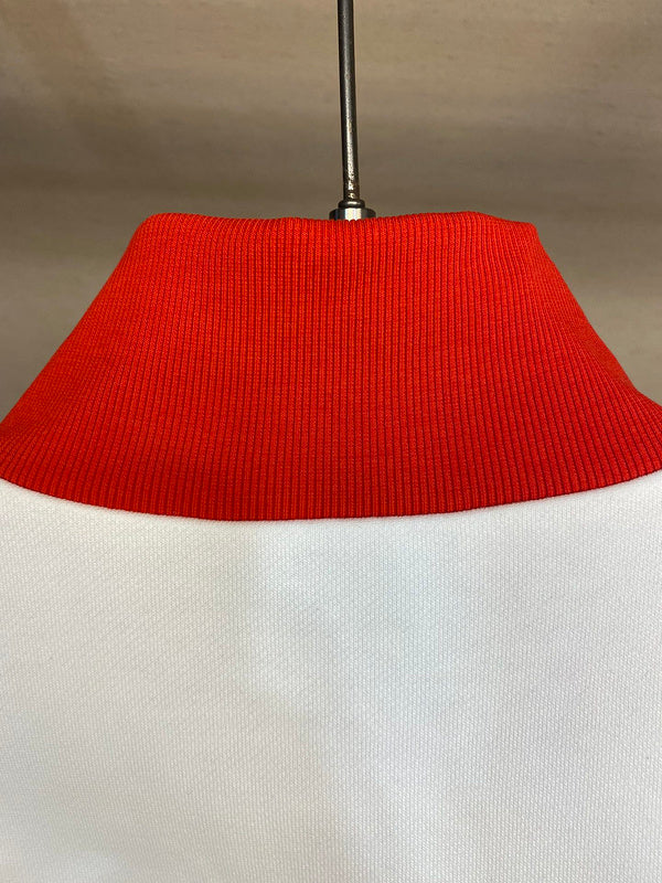 Close-up detail shot of Gucci luxury clothing with runway-inspired design