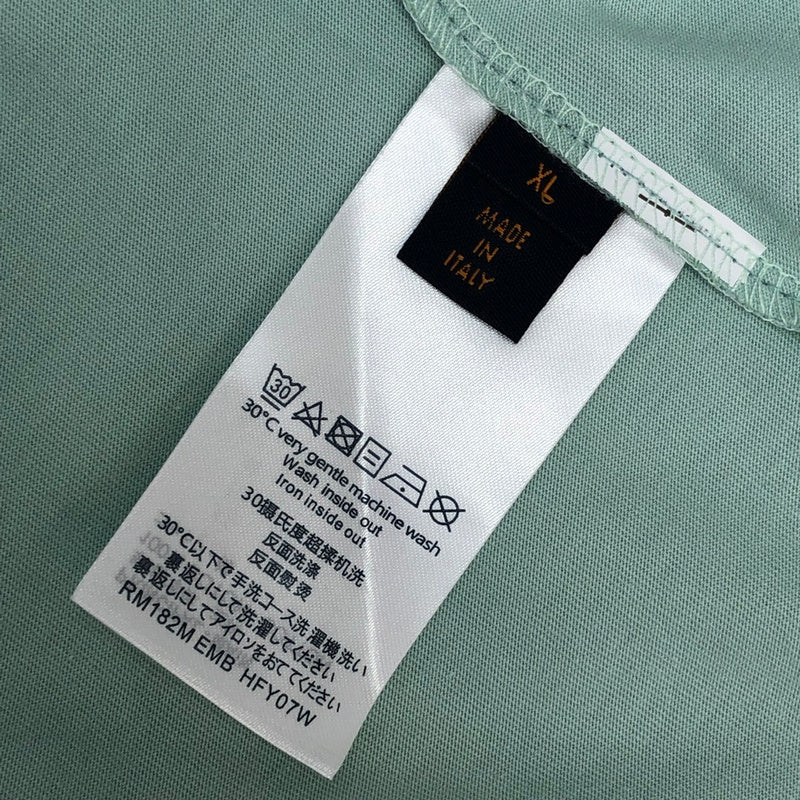 Flat lay presentation of Louis Vuitton cotton t-shirt with logo-detail design