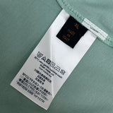 Flat lay presentation of Louis Vuitton cotton t-shirt with logo-detail design