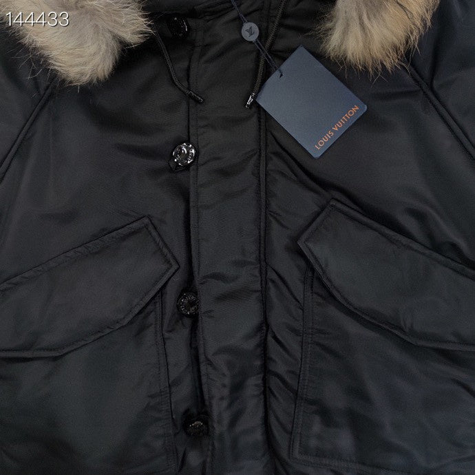 Close-up detail shot of Louis Vuitton luxury clothing with everyday silhouette