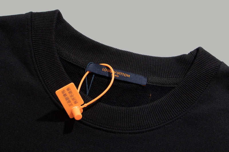 Flat lay presentation of Louis Vuitton luxury clothing with tailored silhouette