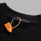 Flat lay presentation of Louis Vuitton luxury clothing with tailored silhouette