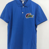 Side profile of Lacoste luxury clothing with tailored silhouette