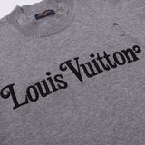 Front view of Louis Vuitton luxury clothing with label-forward styling