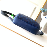 Back view of modern sleek women's handbag – women's luxury accessory