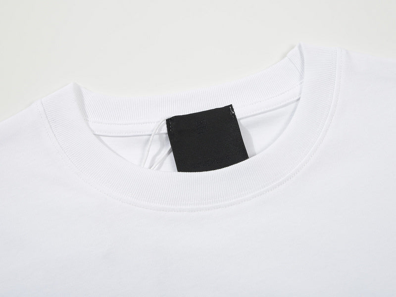 Close-up detail shot of Givenchy luxury clothing with monogram-inspired silhouette