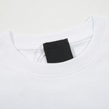 Close-up detail shot of Givenchy luxury clothing with monogram-inspired silhouette