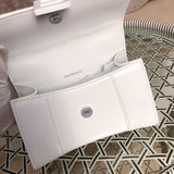 Front view of chic elevated women's handbag – women's statement bag