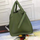 Styled lifestyle shot of refined modern women's handbag – women's statement bag