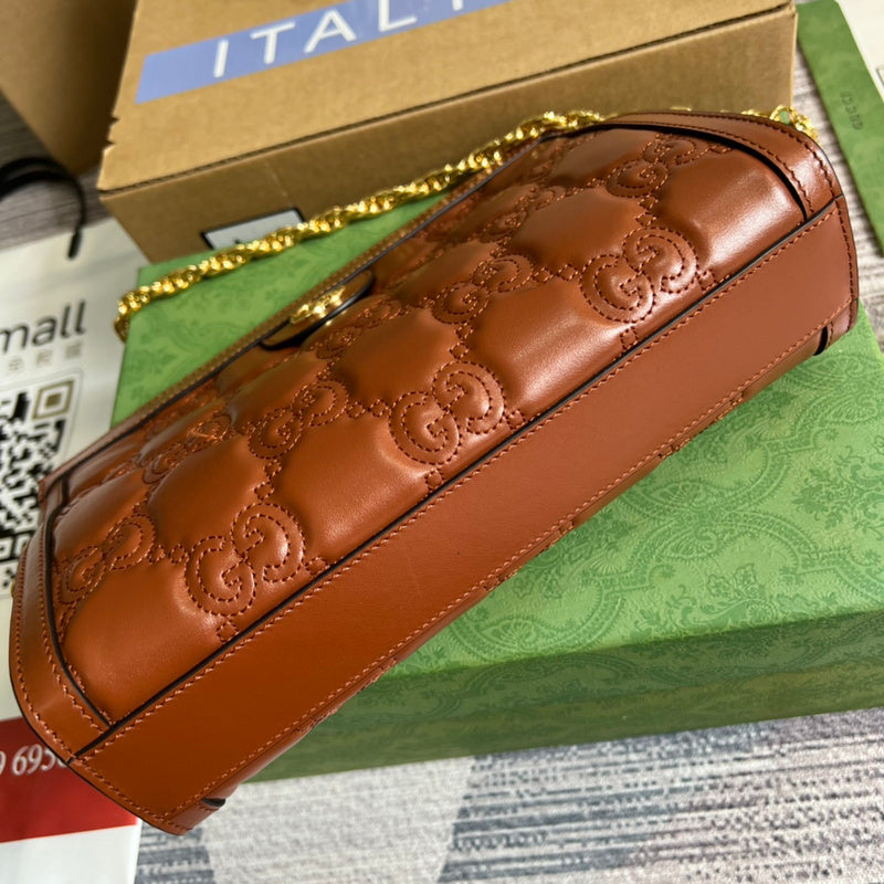 Styled lifestyle shot of refined sleek women's handbag – women's luxury accessory