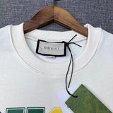 Back view of Gucci luxury clothing with signature branding