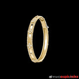 Lifestyle view of Van Cleef & Arpels unisex jewelry piece
