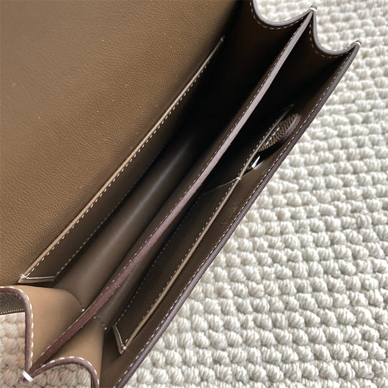 Close-up detail of poised bag design
