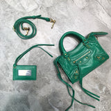 Timeless Premium PU Leather Handbag - Smooth Faux-Leather Exterior | Women's Premium Handbag #639 - side angle view (image 2) of designer-inspired handbag